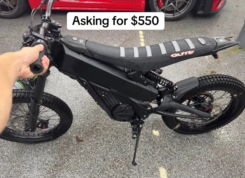 Model: Telaria XXX (Electric Dirt Bike) Type: Off-road / Electric motocross Motor: 6,000 W (peak power) brushless motor Top Speed: ~47–50 mph (75–80 km/h) Battery: 60 V / 32 Ah lithium battery (removable, fast-charging) Range: Up to 40–60 miles per charge (depends on terrain & weight) Weight: Around 110 lbs (50 kg) Suspension: Front inverted fork + rear coil spring shock Brakes: Hydraulic disc (front & rear) Frame: Lightweight forged aluminum Seat upgrade: Custom Guts Racing seat for better comfort and grip   #DirtBikeTikTok #RideElectric #SurronMods	#SurronNation #ElectricMoto