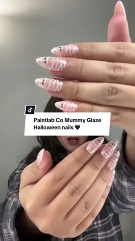 First time trying @paintlabco press-on nails and I’m soo impressed!! These mummy glaze nails are everything and definitely the cutest Halloween nails ever 👻🖤🎃 #fyp #pressonnails #nails #halloweennails #spookyseason 