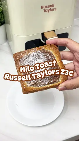 Roti Milo 🍫🍞 Untuk Campuran Coklat: 1 biji telur 2½ sudu besar Milo 1½ sudu besar susu pekat manis Untuk Roti: Tekan roti untuk membentuk acuan. Masak dalam air fryer pada suhu 180°C selama 10 minit. Taburkan gula aising dan nikmati! ✨ #RussellTaylors #applianceforeveryhome #homeappliances #ModernHomeAppliances #AirFryer   