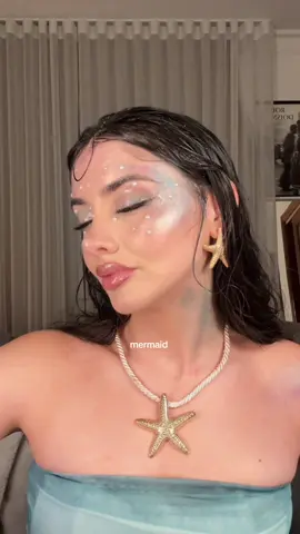 🧜‍♀️ product used:  @garnieraunz vitamin c brightening serum @La Roche-Posay B5 Eye Serum @CeraVe moisturising lotion @Maybelline NY skin tint  @NYX Professional Makeup I know it’s bright eyeshadow palette  @Armani beauty luminous silk concealer @L’Oréal Paris panorama mascara @YSL Beauty eyeshadow palette @Lancôme idole liner @Kérastase absolute glaze drops #halloween #halloweenmakeup #mermaid 
