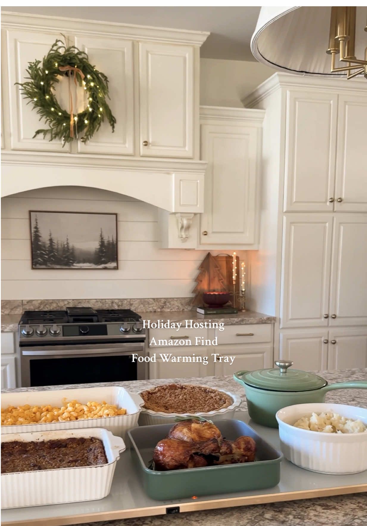 Holiday Hosting Amazon Find! Electric food warming tray!! Get ready for the holidays with this electric food warming tray! This beautiful glass top tray is big enough to keep your whole meal warm! It has two temperature settings to keep your food piping hot. It can hold up to 6-8 dishes and it’s easy to wipe clean! It comes in two colors! #entertainingathome #amazonhome #hostingideas #amazonfinds #homehacks 