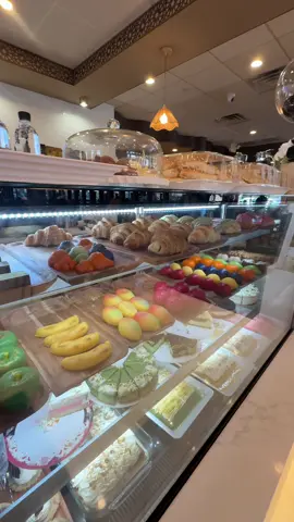 viral fruit pastries in milwaukee area. will be doing a part 2 of our thoughts on what we got, we ended up getting: pistachio dessert, coconut pastry, tiramisu, pistachio latte and a mufuwar 🥭 #haraz #oakcreek #coffeehouse #fruitpastries #viraldesserts 