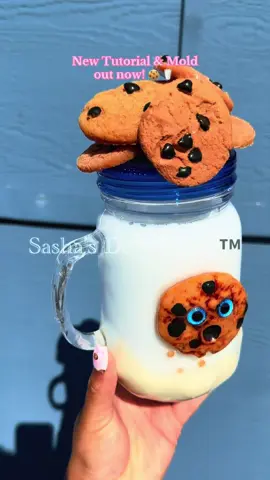 This has been so much fun to create! My custom cookie mold is EXCLUSIVELY available on my site! 🍪 🥛 Learn how to create this cup on YouTube! @Sculpey Super Sculpey polymer clay @Adhesive Apothecary Milk for Santa Solution @SwearyKim Tumblers & More blank snow globe #sashasdecorations #tumblertutorial #polymerclay #cookies #cookiesandmilk #fauxfood #fakefood #epoxyresin #snowglobetumbler #snowglobe #snowglobecup #sculpting 