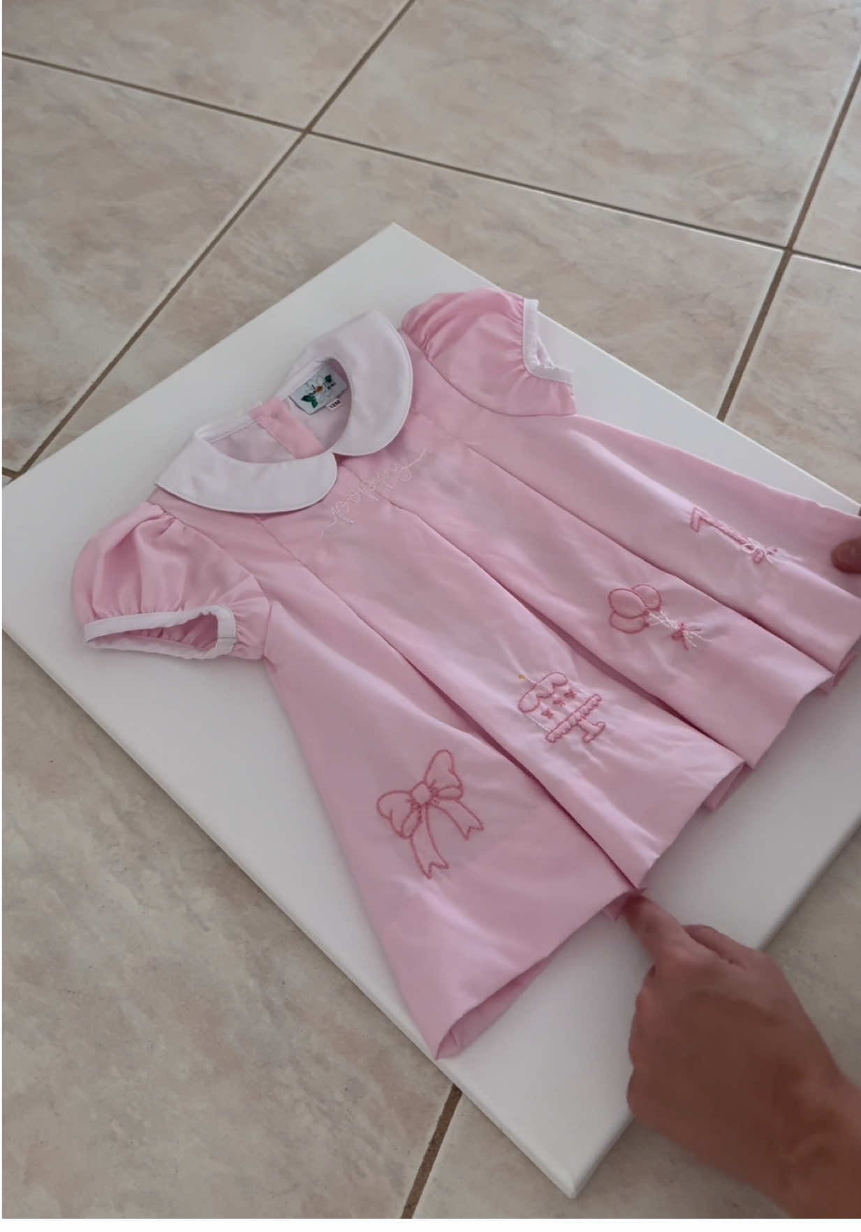 your sign to frame + hang your baby’s first birthday outfit 🥹🫶 #babysfirstbirthday #momtok #toddlermom #toddlergirlmom #nurserydecor 