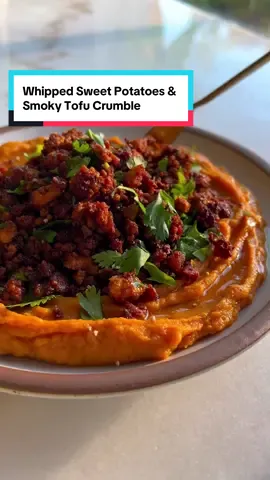 sweet potatoes and big dreams, so whip them and top with this crumble for all the fall vibes #plantbasedrecipes #sweetpotatoes #tofu  Whipped Sweet Potatoes Avocado oil for roasting 1 bulb garlic 3 medium sweet potatoes, cut in half lengthwise 6 sprigs thyme 3 large shallots, cut in half lengthwise 2 tbsp apple butter (optional) 1/2 tsp five spice (optional) Kosher salt Smoky Tofu Crumble 1, 16oz block extra firm tofu, pressed for 15 minutes 1 tbsp smoked paprika 1/2 tsp garlic powder 1/2 tsp onion powder 1/2 tsp dry thyme 1/2 tsp allspice 1/2 tsp fennel seeds 1/4 tsp white pepper 2 tbsp nutritional yeast 2 tsp light brown sugar 1 1/2 tbsp gluten-free tamari 1 1/2 tbsp avocado oil 1/4 cup cilantro leaves, roughly chopped Juice of half a lime Full instructions, servings, tips and ingredient swaps are on my site listed in pro file 🙂‍↕️