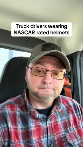 Truck drivers wearing NASCAR rated helmets 