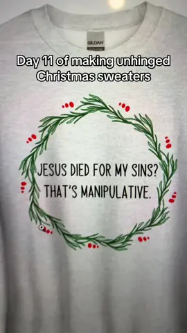 You can grab this unhinged Christmas sweater at my small business, doublecrossclothingco 🖤 #christmassweater #funnychristmassweater #christmas #funnyshirt #unhingedshirt 