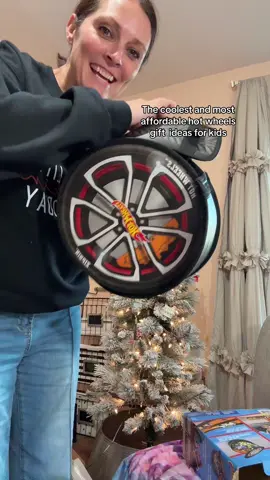 Fun gift idea! Take your hot wheels to go and then turn it into a race track. #giftsforkids #hotwheels #racetracktoy #hoteheelsstorage #toyorganization 