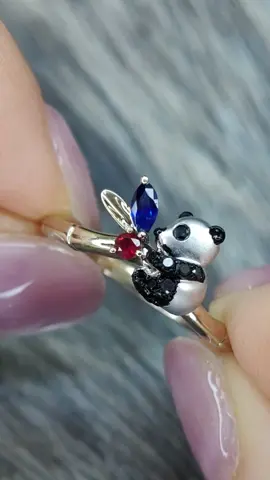 Panda Ring Jewellery This adorable panda ring is a unique and personal creation, featuring a panda holding a bamboo sprig with sapphire and ruby gemstones representing the couple’s birthstones. The design is set on a beautiful champagne gold band, adding a touch of elegance to the playful, meaningful piece. https://gioia.com.sg/personalised-jewellery/ #fyp #tiktok #PandaRing #PersonalizedJewelry #BirthstoneJewelry 
