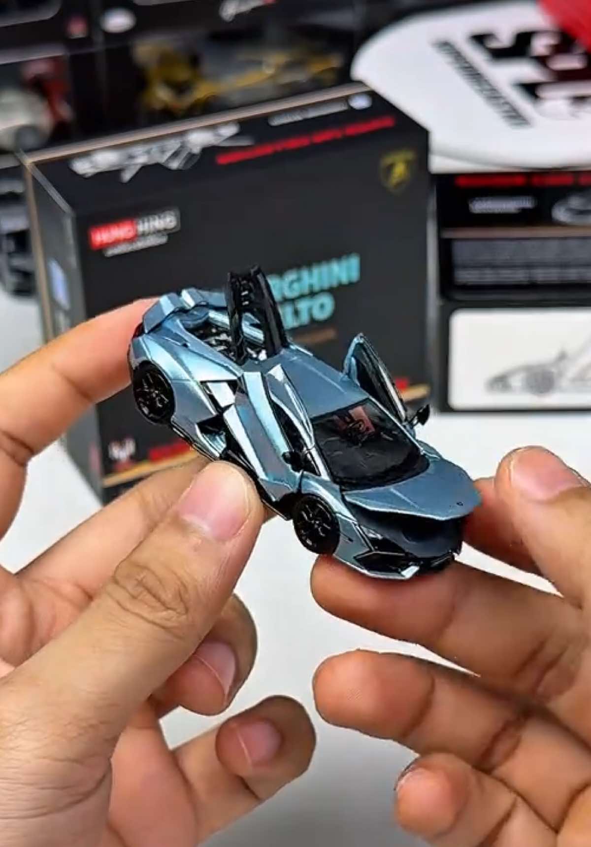 Unboxing the most stunning 1:64 scale Lamborghini Revuelto with an actually butterfly door — a true masterpiece with fully opening parts  A must-have centerpiece for every serious collector. HungHing × APA Xpo 2025 Exclusive Event items.  #164scale #hunghing #apaxpo #lamborghinirevuelto #superdiecastkh 