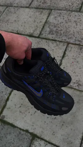 The P-6000 is a mash-up of Pegasus sneakers past. It takes the early 2000s running style to modern heights by combining sporty design lines with breathable textiles. And its foam cushioning adds a lifted, athletics-inspired stance for unbelievable comfort. Colour Shown: Black/Anthracite/Blue Void/Racer Blue Style: IO1904-010 Available now in all sizes on my website 📲 #nike #trainers #p6000 #fyp 