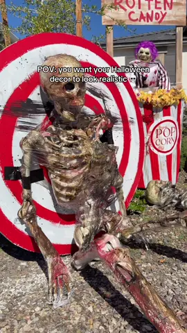 Did you know you can wrap a cheap store bought skeleton in plastic wrap, melt it with a lighter and then cover it in a couple different shades of brown, red and black paints (I used brown stain and red spray paint) it will look horrifyingly realistic! 💀 this is an easy last minute way to amp up your Halloween decor!  #DIY #halloween #diyhalloweendecor #diyyarddecor #halloweendecor    