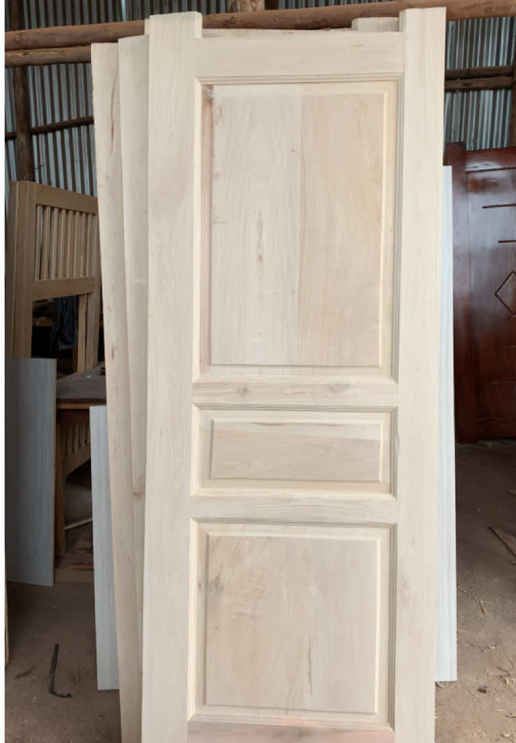 PART 1: Turning raw wood into refined art , one smooth finish at a time. Watch out for the next part to see the results🔥🔥🔥 #tiktokuganda🇺🇬🇺🇬🇺🇬 #interiordesign #doors #hardwood #kampala 