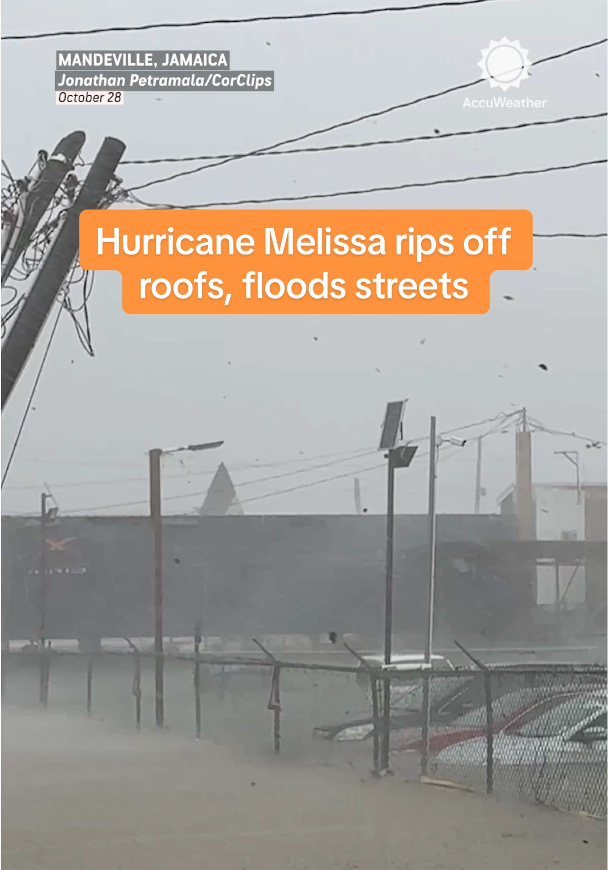 Hurricane Melissa tears through western Jamaica, ripping roofs from homes, flooding streets, and toppling trees as powerful winds hammer the region.