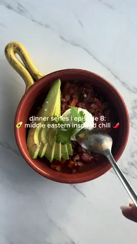 Ingredients:  1 lb Atkins Ranch ground lamb 1 tbsp olive oil  1/2 medium white onion, diced 1/2 medium red onion, diced 2 sticks celery, diced 2 medium carrots, diced 1 red bell pepper, diced 3 garlic cloves, minced 2 cans (15 oz) kidney beans, drained & rinsed 1 can (15 oz) black beans, drained & rinsed 1 can (15 oz) tomatoes  1 cup beef or chicken broth (or vegetable) 2 tbsp tomato paste Spice Blend: 1 tbsp smoked paprika 1 tsp ground cumin 1 tsp ground coriander 1 tsp chili powder  1/2 tsp cinnamon 1/2 tsp red pepper flakes 1 tsp salt (to taste) 1/2 tsp black pepper To Finish Juice of 1 lemon Fresh cilantro, chopped Toppings: sour cream, Parmesan, avocado, and cilantro Instructions:  1. In a large pot, heat olive oil over medium heat. Add your veggies and cook for 5 minutes.  Add garlic and cook 1 minute. 2. Add lamb and cook until browned, breaking it up with a spoon (6–8 minutes). 3. Stir in smoked paprika, cumin, coriander, chili powder, cinnamon, salt, and pepper. Let the spices toast for 1-2 minute until fragrant. 4. Add tomato paste, crushed tomatoes, broth, and all three cans of beans. Stir well to combine. 5. Bring to a boil, then reduce heat and let simmer uncovered for 40-45 minutes. This reduces the liquid and makes it nice and thick. Stir occasionally. 6. Stir in lemon juice, taste, and adjust seasoning. 7. Ladle into bowls and top with sour cream, Parmesan, avocado, lemon juice, and cilantro. Cozy, wholesome, and perfect for fall. . . . #highproteinmeals #dinnerwithme #chilirecipe #middleeastern @Atkins Ranch 