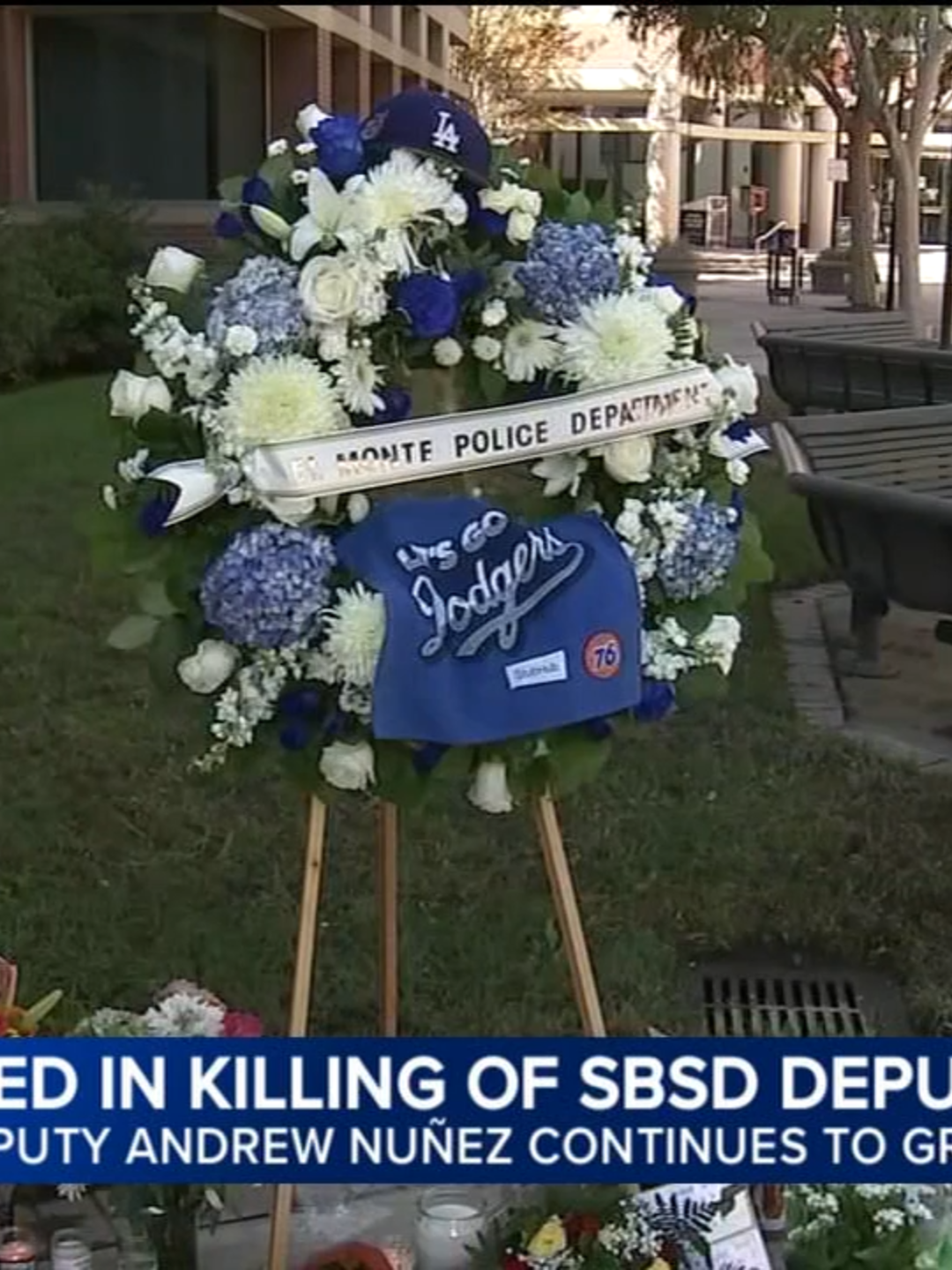 (10/28/25) Outside the sheriff's Rancho Cucamonga station, a makeshift memorial was growing in honor of the slain deputy. Strangers came by to leave candles, flowers, notes, and some to bow their heads in prayer for his family. Read more at the link. #sanbernardinocounty #policechase #motorcycle #deputy