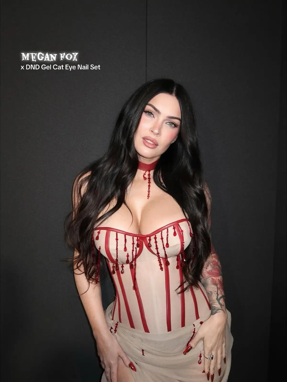 Mother❤️‍🔥🩸 @meganfox makes first post baby appearance, steps out in a DND Gel Blood Cat Eye Nails set for the screening of Jennifer’s Body. Proof she never lost her bite 🦷💋 GET THE LOOK - Blood Cat Eye Nails by @nails_of_la 💅🏽 BLACK OCEAN + SILVER LYNX (Cat Eye) + CLEAR RED Megan’s wearing long stiletto gel extensions. “I started with one coat of BLACK OCEAN, then added a coat of SILVER LYNX (cat eye), followed by an overlay of CLEAR RED to give it that layered blood effect. Finished with chrome details and sealed with Top Coat.” #dndgelpolish #meganfox #jennifersbody #cateyenails #gelpolish 