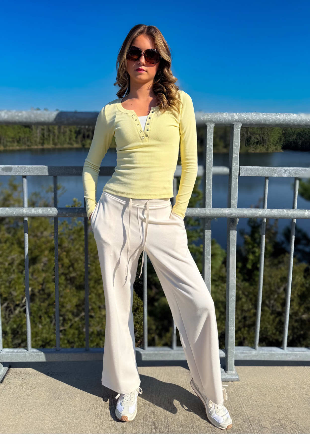 Sunshine Softness ☀️ There’s something about a soft yellow top and a quiet morning breeze that just feels like calm confidence 🌼☁️ This @beaully_store V-Neck Henley is that perfect balance between laid-back and chic — fitted just right, lightweight, and the kind of color that brightens any day. I styled it with creamy drawstring sweatpants and sneakers for an effortless, cozy-cool vibe that still looks polished for errands or a girls shopping day. Shop 🔗 in Bio #OOTD #BeaullyStyle #FallBasics #FashionBlogger #EverydayChic