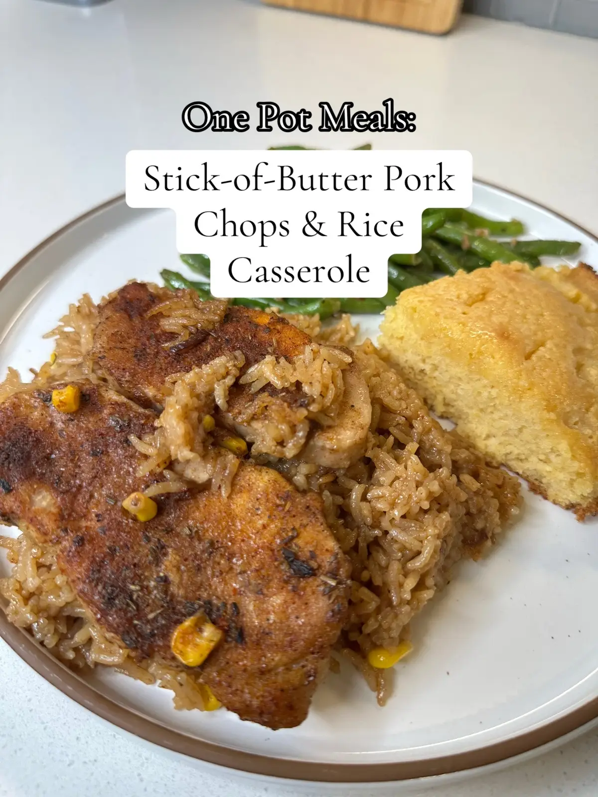 This recipe is so easy and low effort, your lazy ass can do it and still impress everyone you love. One pan, minimal cleanup, and maximum comfort. Plus it literally costed me about $10! Take the night off from eating out and make something deliciously effortless. Full recipe below 👇 🤎🥘 #recipes #comfortfood #casserole #onepanmeal #dinner  2 1/2 cups uncooked jasmine rice 1 can Campbells French Onion soup 2 cans Campbells Beef Consume 1 cup low sodium beef broth or water 1 can sweet corn, drained (optional) 1 stick of butter Grated Parmesan cheese 1 pack pork chops, bone-in or boneless, and seasoned to your preference. Preheat oven to 350°F. Grab a 9x13-inch baking dish. Add the uncooked rice to the dish. In a bowl, stir together the French onion soup, beef consume, and beef broth. Pour the mixture on top of the rice. Add corn. Then slice a stick of butter into thin parts and scatter evenly on top of the dish. The generously spread grated Parmesan cheese on top. Lay the seasoned pork chops on top. Cover tightly with foil and place in the oven for 45 minutes. Remove from the oven, take off the foil, fluff the rice a bit, then place back in the oven uncovered for 15 minutes, or until pork chops are browned and rice is cooked. Take out and rest for 10 minutes, then serve.