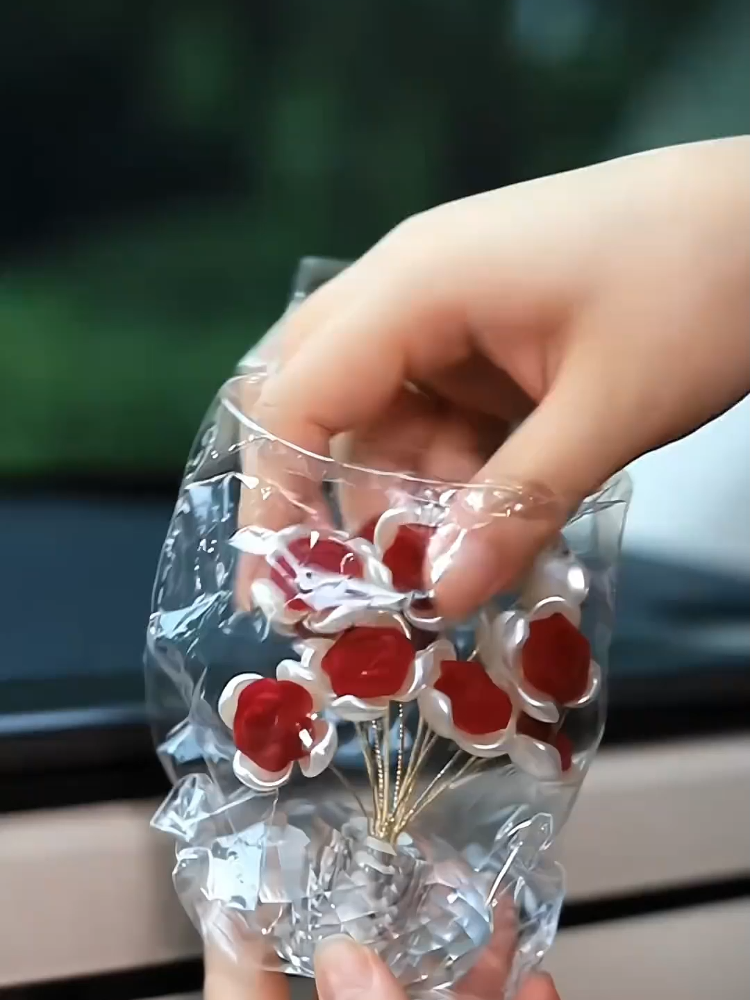 Drive in crystal style. This rose adds luxury to every trip.