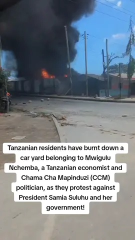 Tanzanian residents have burnt down a car yard belonging to Mwigulu Nchemba, a Tanzanian economist and Chama Cha Mapinduzi (CCM) politician, as they protest against President Samia Suluhu and her government!#tanzaniatiktok #maandamano #live #today #genz 