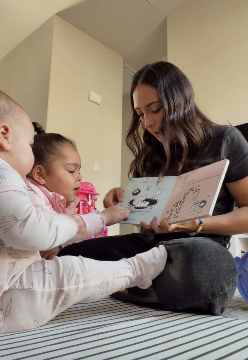This is what story time has been looking like for us— lots of questions, explanations, reading the same books over and over and some good laughs in between. It definitely can feel like I’m in the same routine sometimes— but I’m sure one day I’ll look back and wish I could do it all again. #momlife #reading #learning #toddlermom 