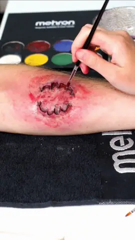 zombie bite for lots of frights this weekend 🥰🩸 makeup by: @polyfrenzy @polyfrenzy.sfx