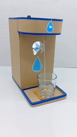 He built a mini water dispenser 💧 using just a carton and a plastic bottle!  Pure creativity — no fancy tools, just innovation and skill.  #HandmadeTechnology #DIYProjects #TechInnovation #CreativeEngineer #UpcycledArt   