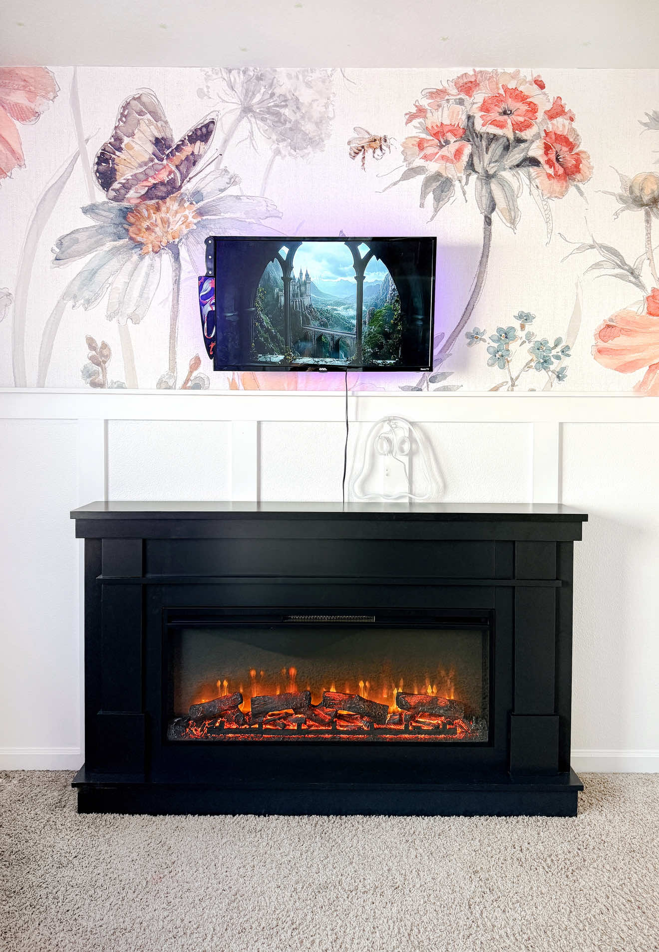 My dream library 💕📚 This used to be the kids’ playroom, but as they got older it just sat empty. So I gave it a new purpose, and now it’s our family library. The wallpaper from @Photowall made this whole space feel fresh and cozy, exactly what I pictured. I still need to add more books, but it’s already my favorite room in the house. The best part? My kids have been getting into reading after seeing me set all this up. We’re all in here every single day now. 🥰 Fireplace @ameriwood  Bookshelves @ikea  #DIY #library #ikea #wallpaper #BookTok 