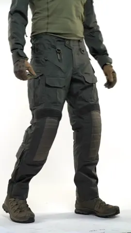 The UATAC Gen 5.6 Pants with Knee Pads are designed specifically for active duty professional personnel. The main emphasis in the development of pants with knee pads was placed on durability and comfort. The pants have been repeatedly updated and improved based on the experience of professional use in extremely difficult conditions. The fabric consists of 65% cotton and 35% polyester, which makes it pleasant to the touch and resistant to tearing and damage. Ripstop weaving and German reinforced threads will prevent the pants from tearing even under heavy loads. Equipped with two ventilation zones for improved thermoregulation. Insertable knee pads (included) are adjustable. Knee pads of the new generation are more convenient to use. Externally protected by reinforced CORDURAÂ® 500d Brookwood® USAÂ fabric. For convenient use, the pants are equipped with 11 pockets - two pockets in the front and two pockets in the back, 2 large cargo pockets (Left - equipped with two stabilizing elastics for fixing a water bottle or accessory and a carabiner; Right - equipped with two mesh compartments), two front pockets with adjustments the height of the knee pad inside, two pockets for small things in the lower part, a pocket for a knife on the right side.