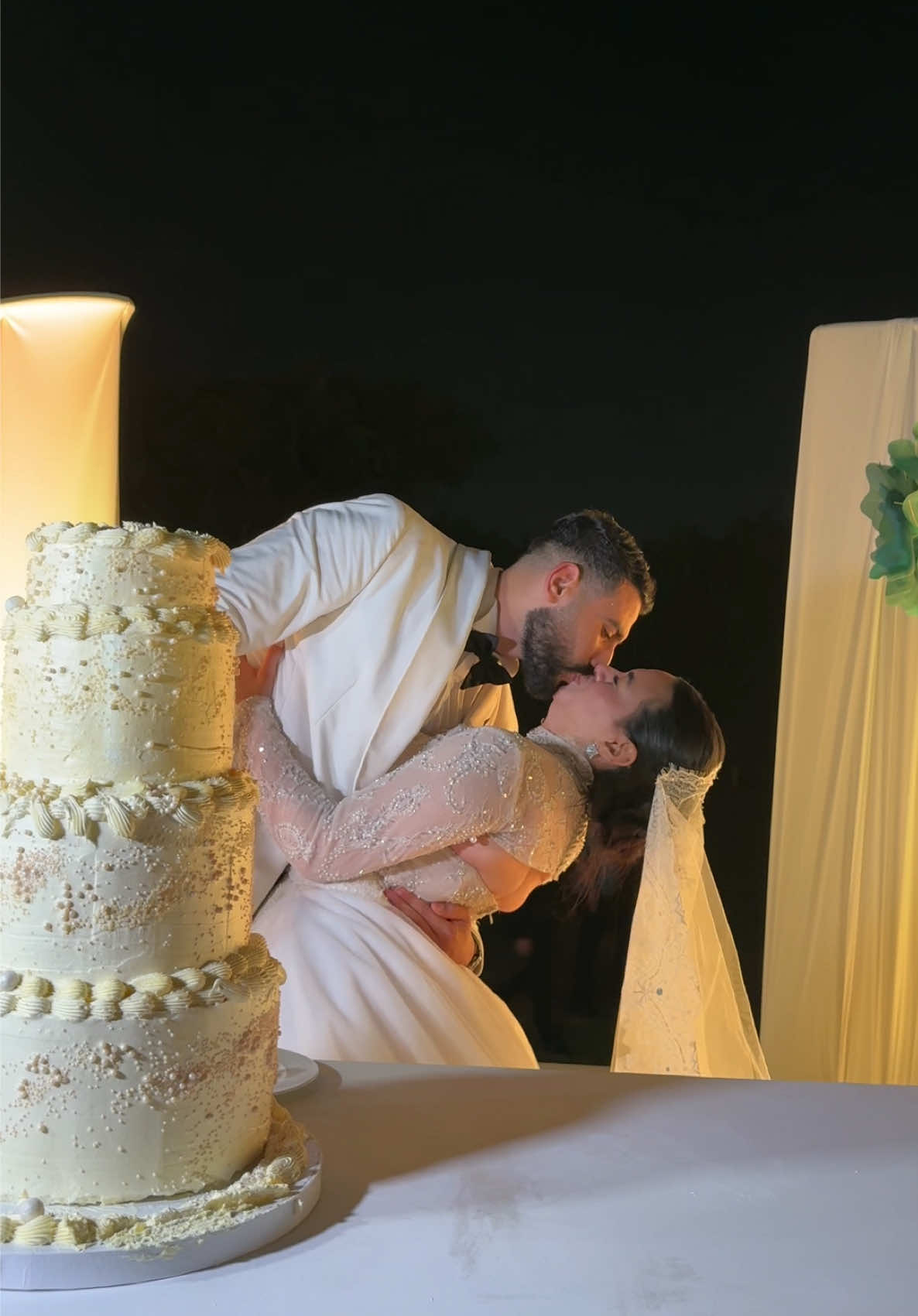 A kiss to seal our sweetness forever 🥃 Wedding Content creator: @seven.snaps  Wedding Planner : @rahmah0ssny  Photography : @karem_hamdy_photography  Mua : @emanaly_makeupartist  Hairstylist : @beautysalon_h1  Wedding Live Painting : @leena_art1  Venue : @maison_de_joie_villa