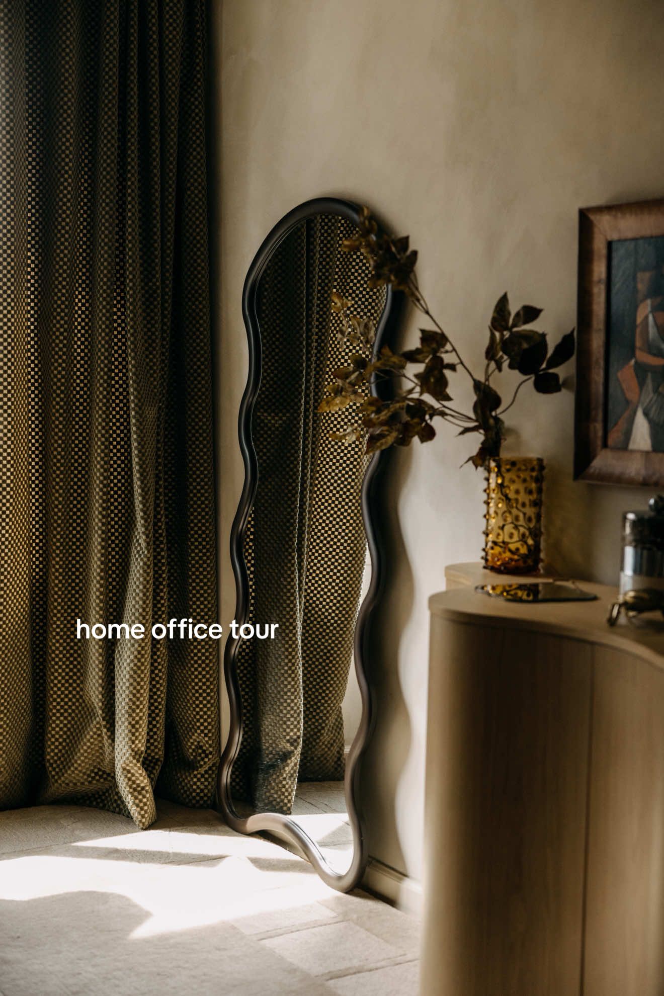 I decided to makeover this space while I was recently out on medical leave for my spine surgery, and it is absolutely  my favorite space in my apartment.  The walls have been lime washed, and I have spent years acquiring the meaningful pieces that have been collected in this room. . If you’re interested in any links, you can click on the Linktree in my bio, and then click on “ ShopMy style and home decor”, and there’s an entire shelf with all the items from my home office. . Curtains, sideboard: @@luluandgeorgiaDesk: @@crateandbarrel Bookshelf: @@Castlery US Rug: @@RugsUSA Vintage Art: @@Lone Fox Leather desk mat, mirror: @@Etsy Journal: Paper Rebuplic  Stems: @@Afloral.com Sconce: @@Virginia Sin Paint: Tikal limewash by  @Portola Paints done by @Pristine Painters   Books:  @eastonpress  Candle: New York by @Hotel Lobby Candle  . Home decor, nyc apartment tour, nyc apartments, home design, interior design, home office design inspo, how to style a bookshelf, home decor inspiration #homedecor #interiordesign #cozyhomedecor #cozyapartment 