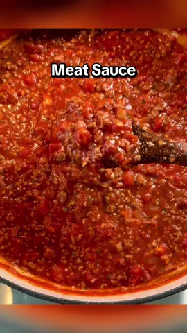 Part 1 of Sunday Dinner  Making the Meat Sauce: 1 pound ground beef 1 pound spicy sausage 1 large onion, chopped 4 cloves garlic, minced 1 bay leaf 2 teaspoons dried basil 2 teaspoons dried oregano 2 tablespoons olive oil 3/4 cup red wine 3 (28-ounce) cans crushed tomatoes 1 carrot, chopped  Salt & Pepper to taste Heat oil in a large heavy pot over medium high heat. Brown ground beef and sausage. Drain. Stir in onion and cook for 4 minutes. Stir in garlic, bay leaf, basil and oregano. Add wine, crushed tomatoes, and carrot. Bring to a boil and reduce heat to medium. Simmer uncovered until sauce has thickened about 45 minutes. Taste and season with salt and pepper. Yield: 12 cups #meatsauce #italianmeatsauce #italiandinner #sundaydinner #familydinner