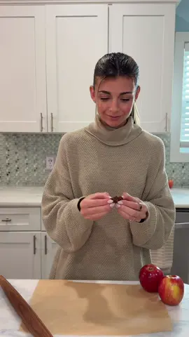 Viral Date Caramel Candy Apples 🍎  This is my spin on the viral caramel date apple—made with simple, wholesome ingredients you can feel good about!🍎 They are perfect for school lunches, after school snacks, or just as a simple pick me up throughout the day 🤗 https://cookingkatielady.com/recipe/healthy-viral-date-caramel-apple/ Line a flat surface with parchment paper and roll out 9 pitted Medjool dates between two sheets until thin enough to wrap around your apple. Place the apple in the center, use the parchment to press the dates snugly around it, then freeze for 5–10 minutes. Melt 100g dark chocolate chips with 1 tbsp cashew butter until smooth, then drizzle or coat the apple completely. Add toppings like nuts, pretzels, coconut, or sea salt, freeze for another 5 minutes to set, and enjoy! #caramelapple #apple #dateapple #refinedsugarfree #healthysweets 