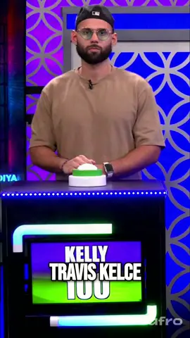 Wait, Travis Kelce signed *what*? This game show moment is absolute gold. Bet he never saw that one coming. #TravisKelce #GameShow #NFL #Sports #Funny