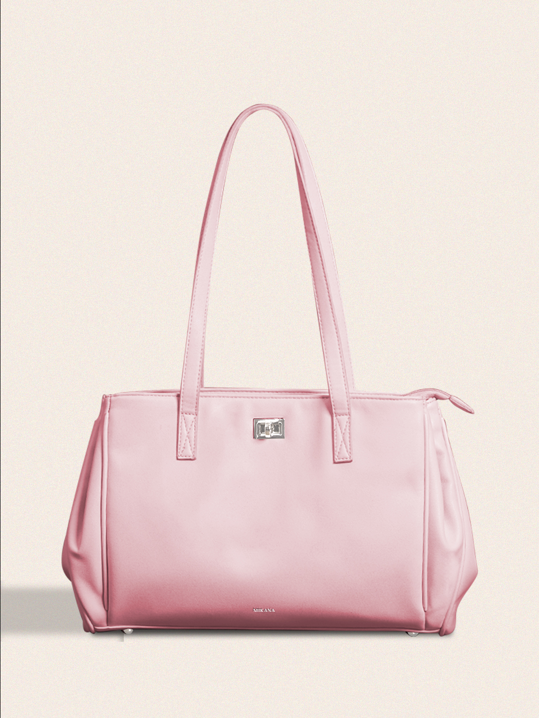 Curves that carry, edges that empower. 💖 #MikanaCarefreeLuxury #ModernMavenCollection