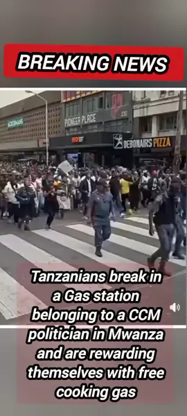 Tanzanians break in a Gas station belonging to a CCM politician in Mwanza and are rewarding themselves with free cooking gas #fyppp #trending #viral #tanzaniatitkokers 
