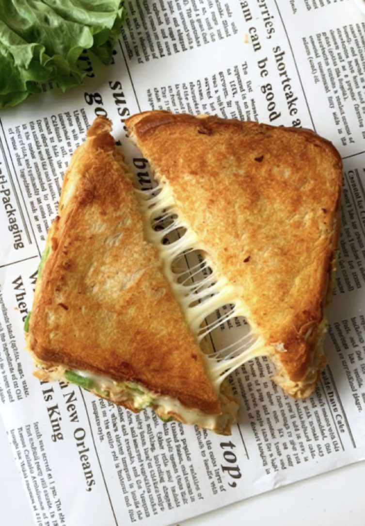 Crispy on the outside, creamy and cheesy on the inside — this classic melt chicken sandwich is pure comfort in every bite 🤤🥪 recipe: For the Chicken: In a bowl, add 330g boneless chicken, salt to taste, 1 tsp paprika powder, 1 tbsp garlic powder, ½ tsp black pepper powder, and ½ tsp white pepper powder. Mix well to coat the chicken evenly. Heat 2–3 tbsp oil in a pan and cook the chicken on low to medium flame for 8–9 minutes, or until fully cooked. Let it cool, then shred the chicken. For the Filling: In the shredded chicken, add ½ cup finely chopped cabbage, ½ cup chopped capsicum, ¾ cup garlic mayo, 2 tbsp hot sauce, ½ tsp black pepper powder, ½ tsp white pepper powder, and salt to taste. Mix everything well — your creamy chicken filling is ready. Assembling the Sandwich: Take a slice of bread, spread the chicken filling, and place mozzarella cheese slices on top. Cover with another bread slice and repeat if making multiple sandwiches. Heat a pan with a little butter and grill the sandwiches until golden and crispy on both sides. Serve warm — crispy outside, creamy and cheesy inside! 🧀✨ #foryou #foryoupage #fyp #fypシ #fypシ❤️💞❤️                