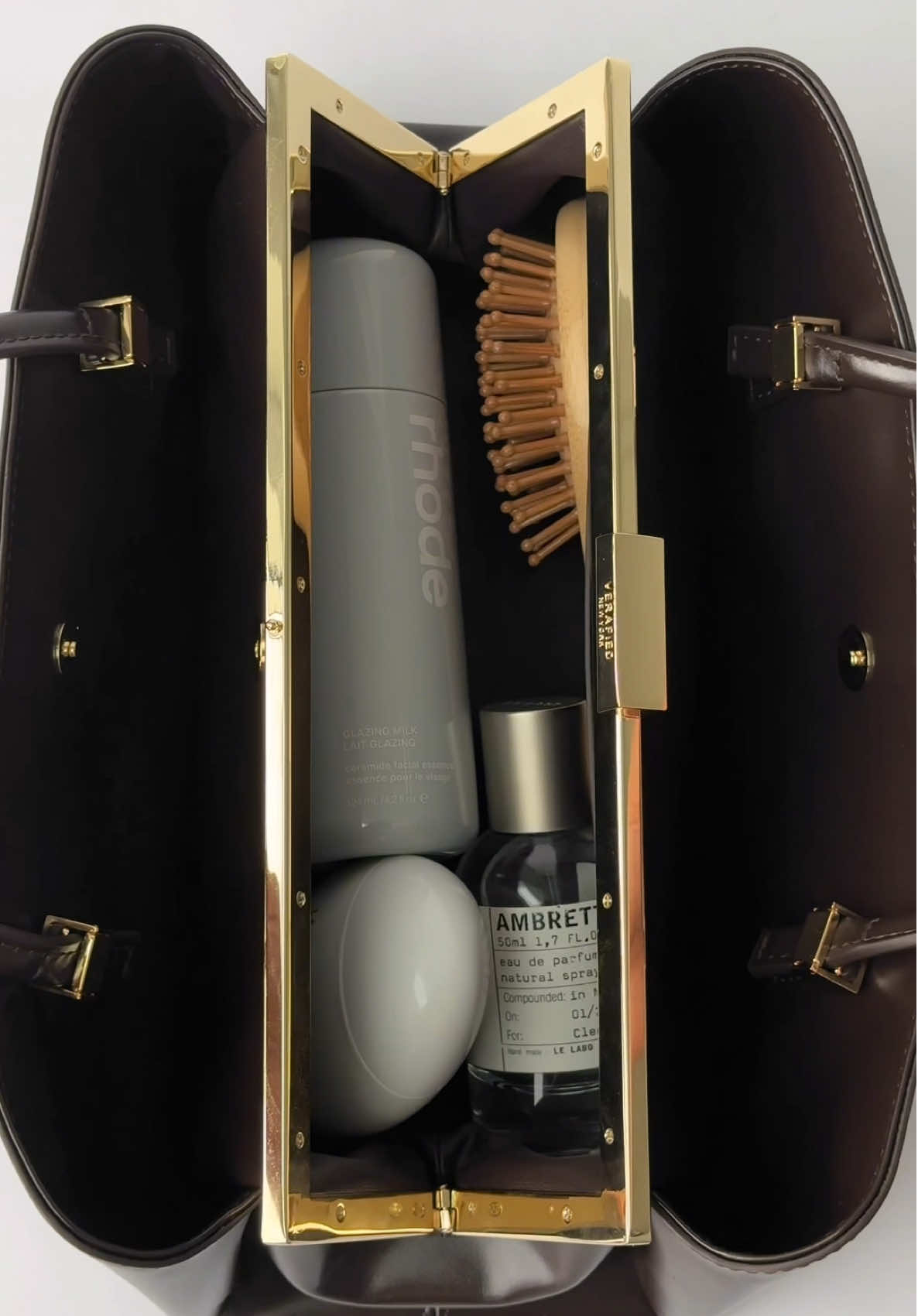 A peek inside the Chocolate Éclair Bag#VERAFIED #whatsinmybag #asmr #brownbag #fyp 