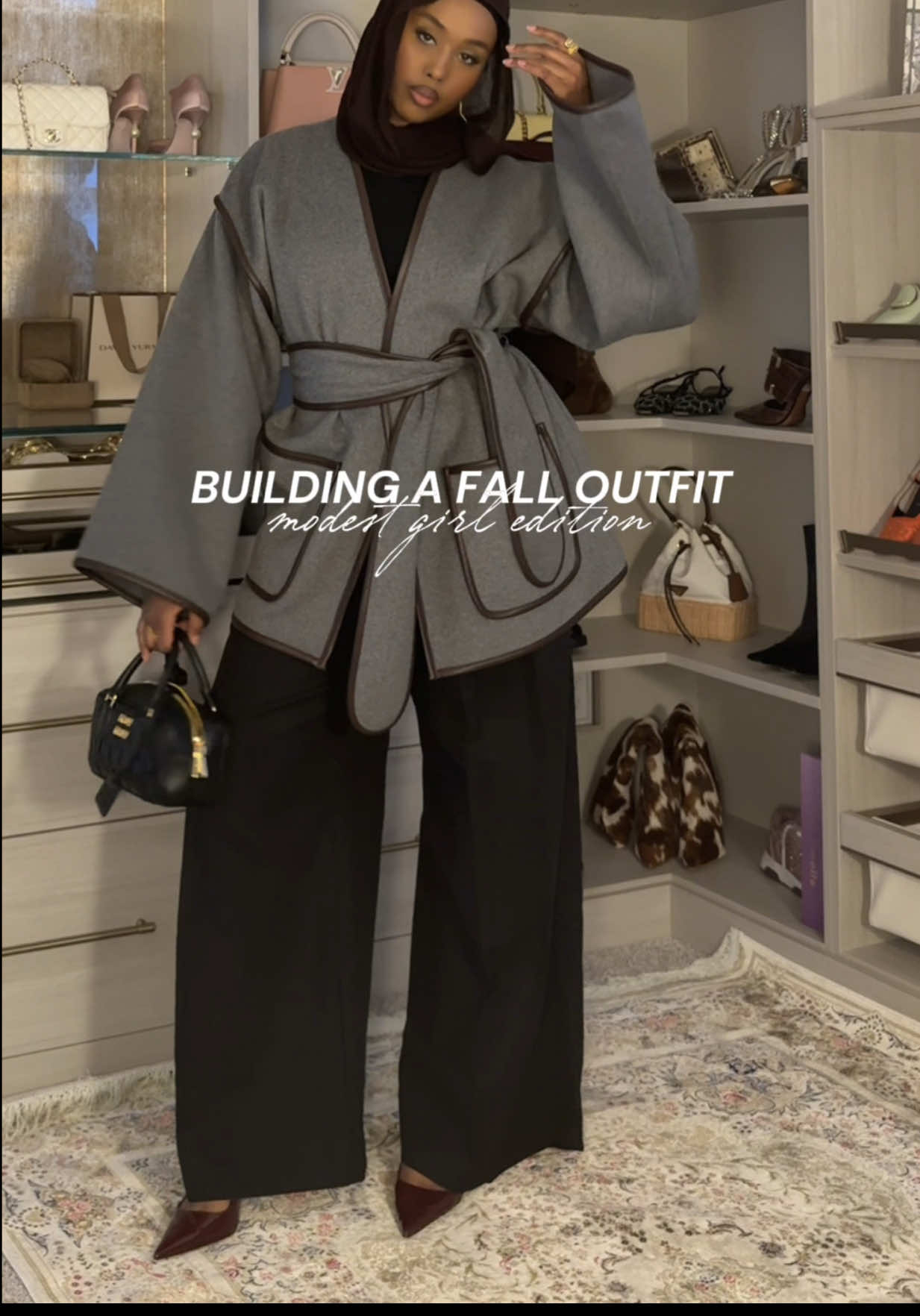 Let’s build a modest fall outfit together 🍁 If “simple but chic” is your entire fall aesthetic, this one’s for you 🫶🏾✨ Coat: @Revolve - HELSA  Pants: @Meshki  Heels: @Mango  Bag: @Miu Miu  Hijab: @klaythelabel  