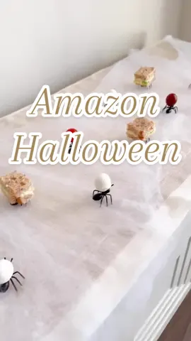 I regret not using a sandwhich cutter to make the sandwiches look more neat, but you can use these ants to hold up any hors d’œuvres or fruits & berries 💜  #amazonfinds #halloween2025 #halloweenpartyideas #horsdoeuvres #halloweenparty🎃  