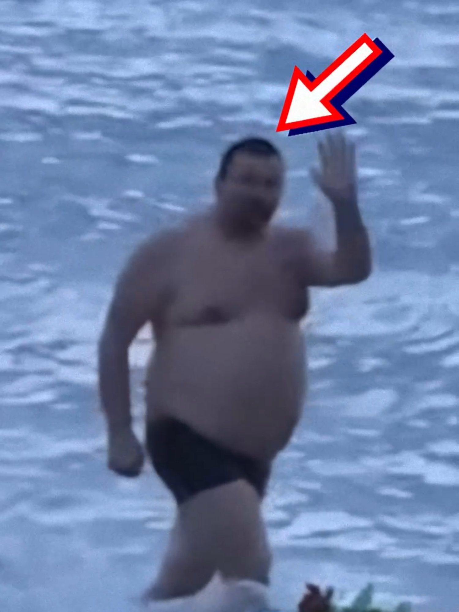 Guy Ruins Perfect Engagement 💍 A romantic beach proposal turns unexpectedly hilarious when a confident man in swimming trunks emerges from the water during the knee-down moment, proudly walking through the frame and waving at the camera like it's his own show.