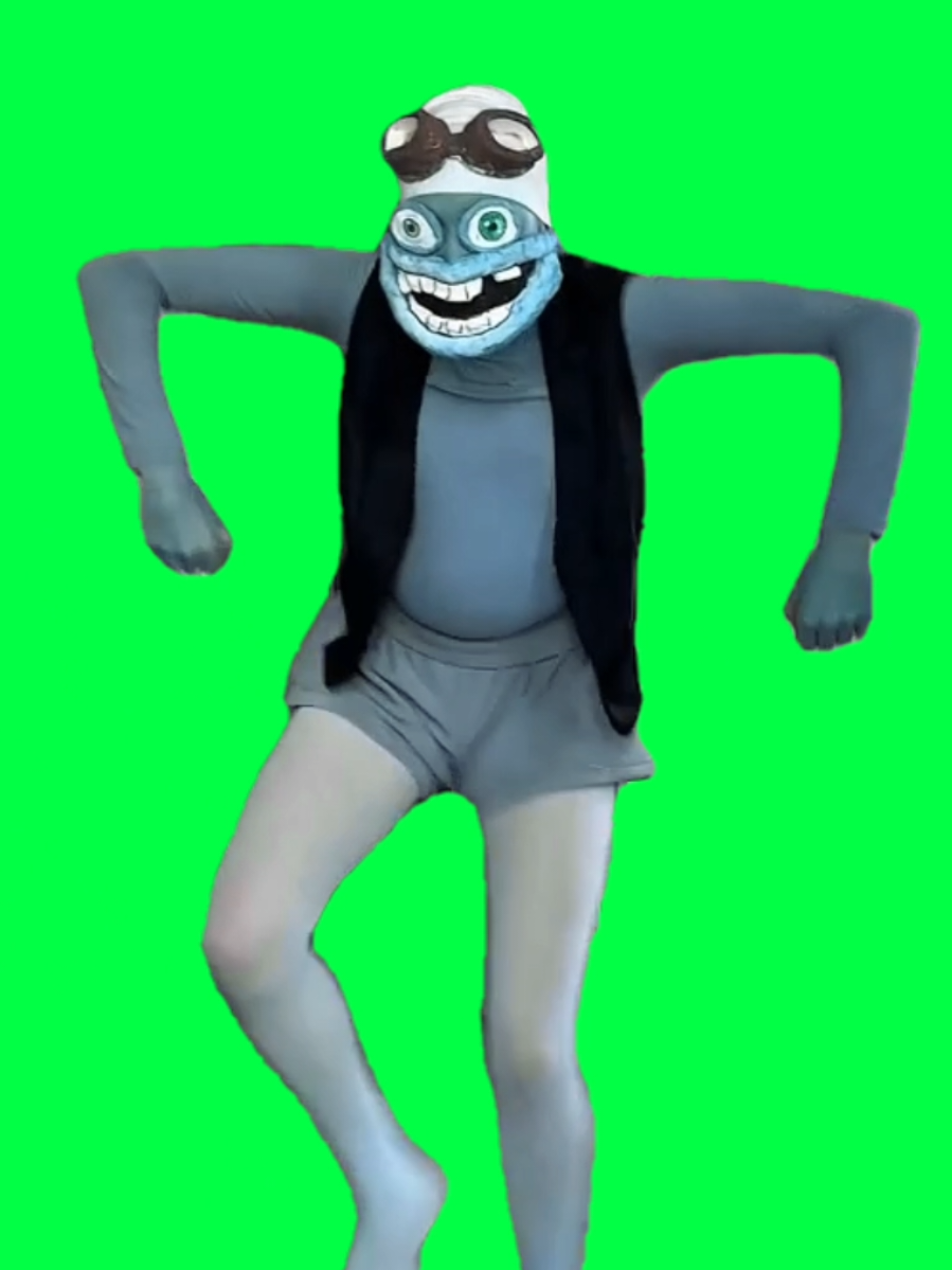 Use this CapCut green screen of someone dressed as Crazy Frog—the iconic animated frog character wearing his goggles and wide grin—striking a pose or doing a quick dance. Insert your own background or scene, add text overlays or music (like the Axel F remix), and transform this into a high-energy meme edit or character reveal. Ideal for nostalgic content, dance memes, or fun throwback vibes that tap into early-2000s internet culture. #CrazyFrogCosplay #AxelFRemix #ThrowbackCharacter #DanceMemeTemplate #greenscreenedit