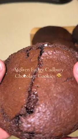 Makes: 8 large “lava-style” cookies Dry Ingredients 	•	(140g) all-purpose flour 	•      (75g) Cadbury drinking chocolate powder 	•	½ tsp baking soda 	•	¼ tsp salt Wet Ingredients 	•	 (115g) unsalted butter, melted 	•      (90g) dark chocolate, melted (or high-quality milk chocolate if you like sweeter) 	•	 (140g) dark brown sugar 	•	 (60g) granulated sugar 	•	1 large egg + 1 extra egg yolk 	•	1 tsp vanilla extract Mix-ins 	•	(170g) chocolate chunks (milk or dark) #fyp #cookies #molten #viral #EasyRecipe 