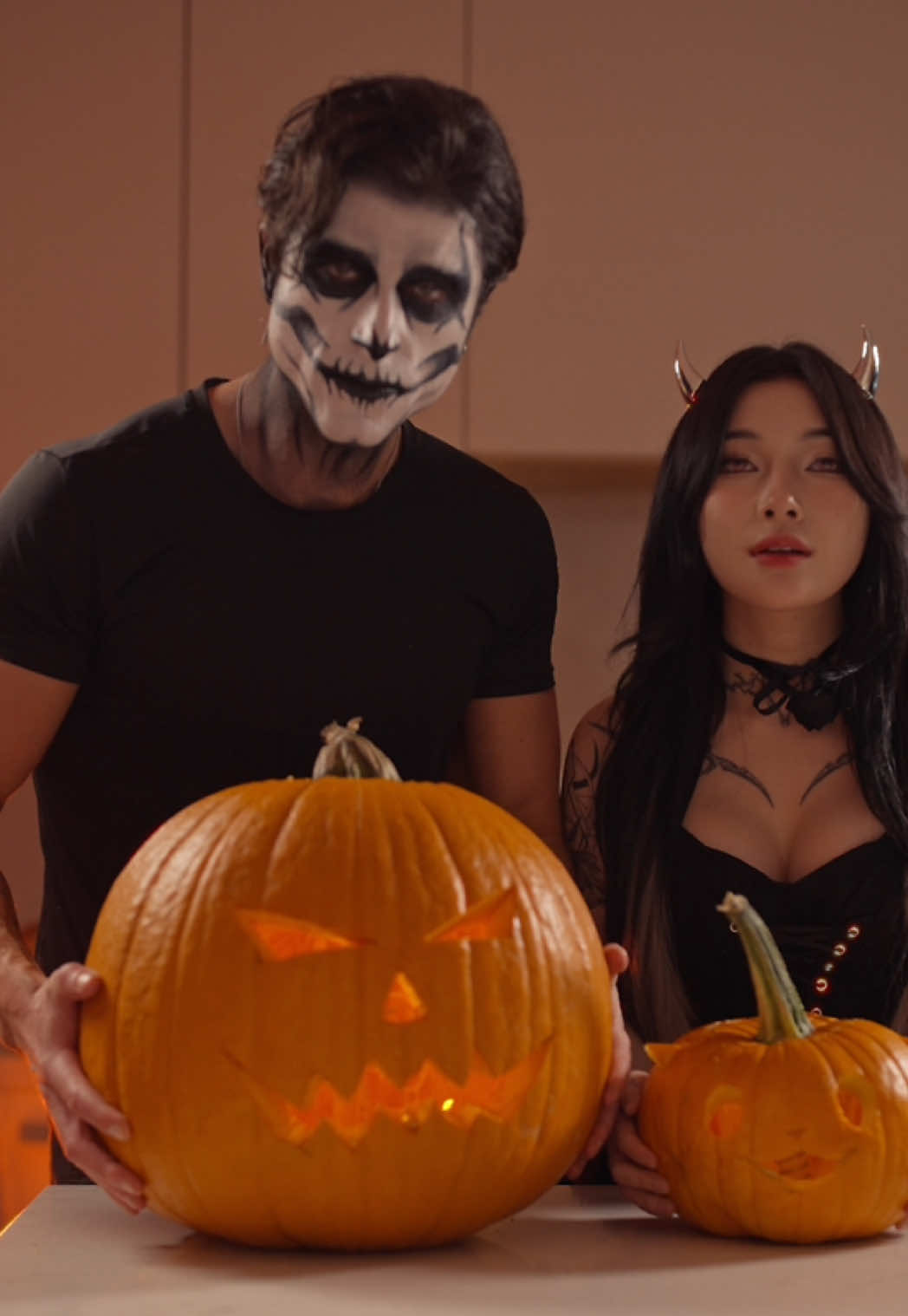 Trick or treat? @Atlas  Spiced pumpkin cake with a creamy pumpkin filling and a smooth orange glaze. Big soft, warm, and a little dangerous.