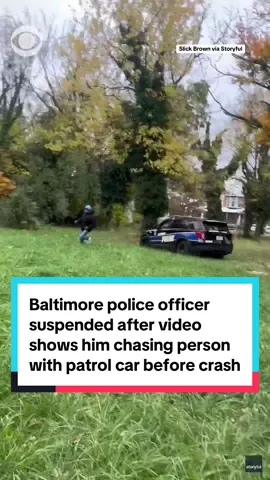 A Baltimore police officer has been suspended after a video showed him driving aggressively and nearly running over a person with his cruiser in West Baltimore. The video shows a person running away, and the officer following through a grassy field and in the Park Heights neighborhood, before crashing his patrol car. It is unclear what led up to the incident or if there were any injuries. The Baltimore Police Department said the officer's bodycam footage is being reviewed and an internal investigation was underway. #baltimore #westbaltimore 