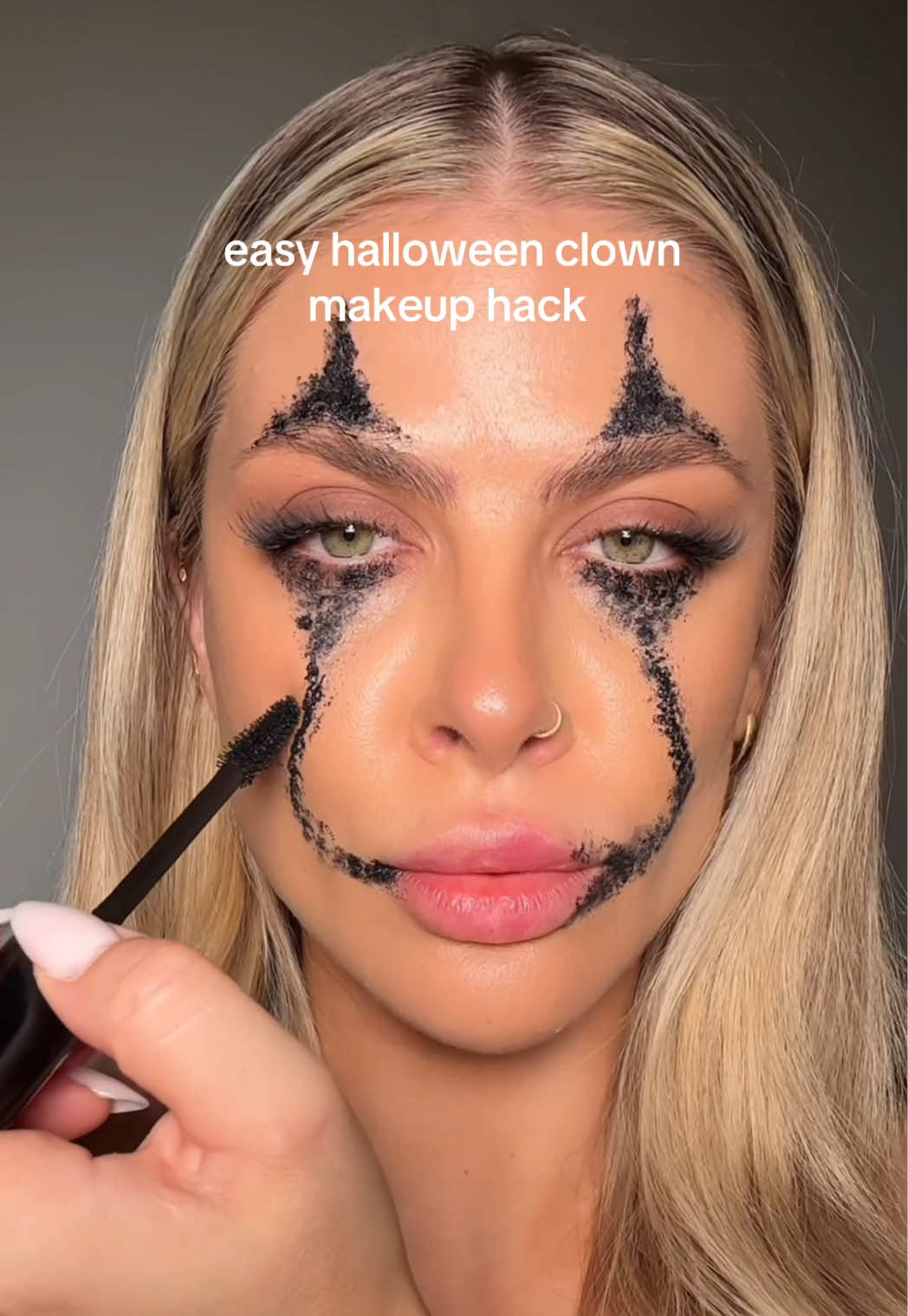 Who knew your mascara could double as a tool for your costume? 🤡✨ @MONIKA MUA just dropped the easiest last-minute clown look you'll want to recreate this Halloween 💋🎃  #revolve #makeuphack #clownmakeup #halloweenmakup #fyp 