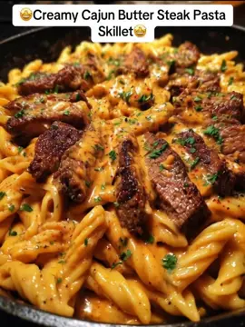 Cajun Steak Penne with Ranch Honey Cheese Sauce Recipe Ingredients: 1 lb sirloin steak, cut into thin strips 2 tbsp Cajun seasoning 1 tbsp olive oil 12 oz penne pasta 2 tbsp butter 1/2 cup heavy cream 1/2 cup ranch dressing 2 tbsp honey 1 1/2 cups shredded cheddar cheese 1 tsp garlic powder 1 tsp onion powder 1 tsp Salt, to taste 1/8 tsp black pepper Fresh parsley (for garnish) Cook the penne pasta according to the package instructions. Drain and then set aside. While the pasta boils, season the steak strips with Cajun seasoning, salt, and pepper. Heat the olive oil in a large skillet over medium-high heat. Add the steak and sear for about 2-3 minutes, until browned and cooked through. Remove from the skillet and set aside. In the same skillet, melt butter over medium heat. Add the heavy cream, ranch dressing, and honey, stirring to combine. Let sauce simmer for 2-3 minutes. Add in the garlic powder, onion powder, and black pepper. Once the sauce is smooth, add the shredded cheese and stir until the cheese has fully melted into the sauce. Add the cooked pasta to the skillet and toss to coat in the creamy sauce. Return the steak into the skillet and stir to combine everything. Let everything cook together for another 2-3 minutes, ensuring the pasta is well-coated and the steak is heated through. Garnish with fresh parsley and cracked black pepper before serving. #tiktokviral #mumebertha #quickrecipes #cajunsteakpasta #creamycajunbuttersteakpastaskillet 