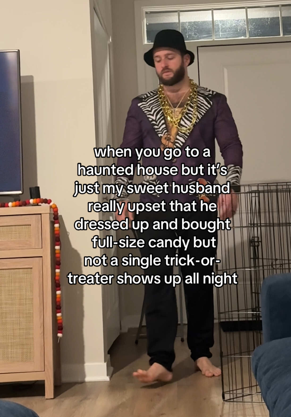 My poor buddy 🖤 he’s genuinely so sad. We’ve had our porch light on and everything! #hauntedhouse #fyp #sadhusband #trickortreaters #fullsizecandybars 