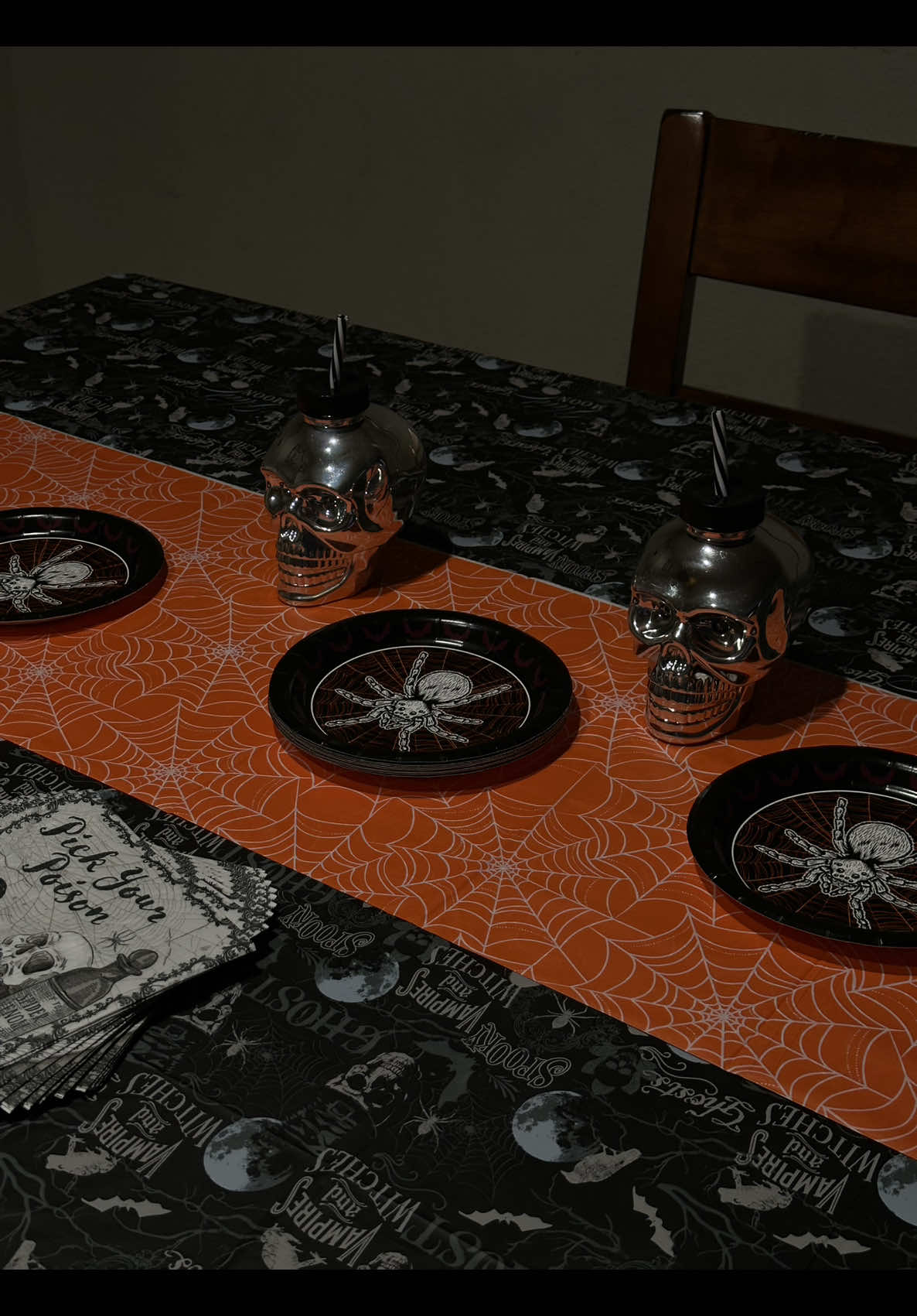 cute + simple halloween table decor 🕷️🧡💀 spooky day is becoming my favorite holiday—well, actually, the 25th and spooky day are neck and neck, but i’ve been loving halloween the most lately—i think my North Node in Scorpio is taking over 🤭🖤 #halloweendecor #dollartreefinds #dollartreediy #halloweendiy #scorpioseason 